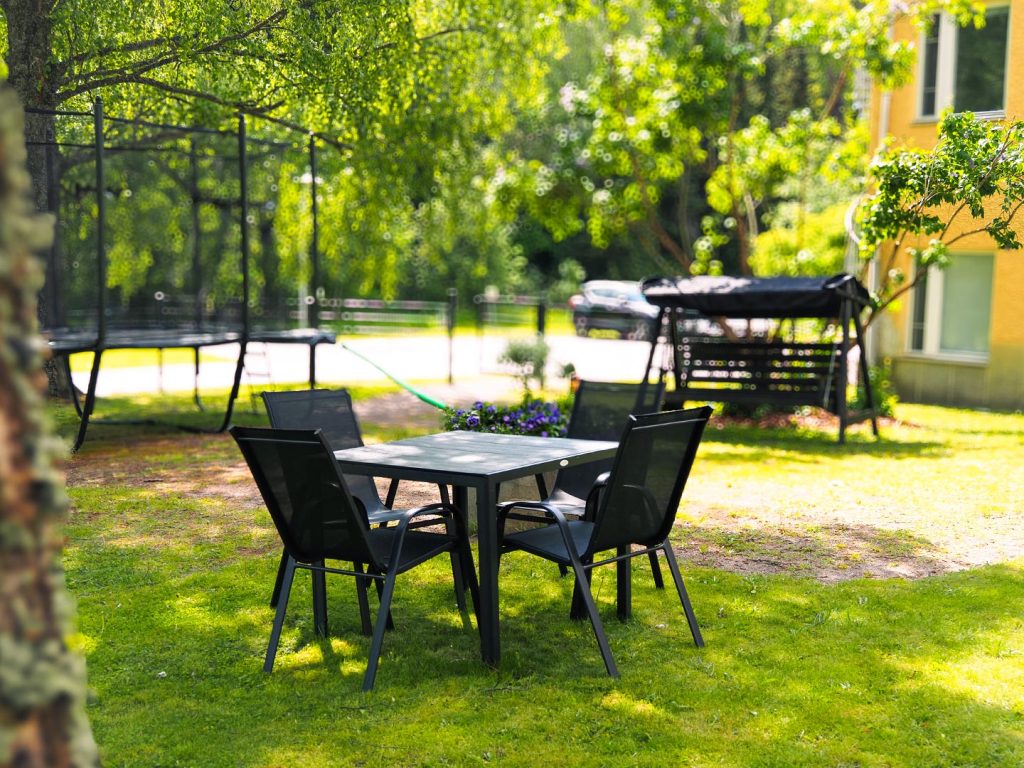 the green yard of the hotel